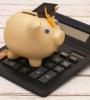 Une tirelire sur une calculatrice